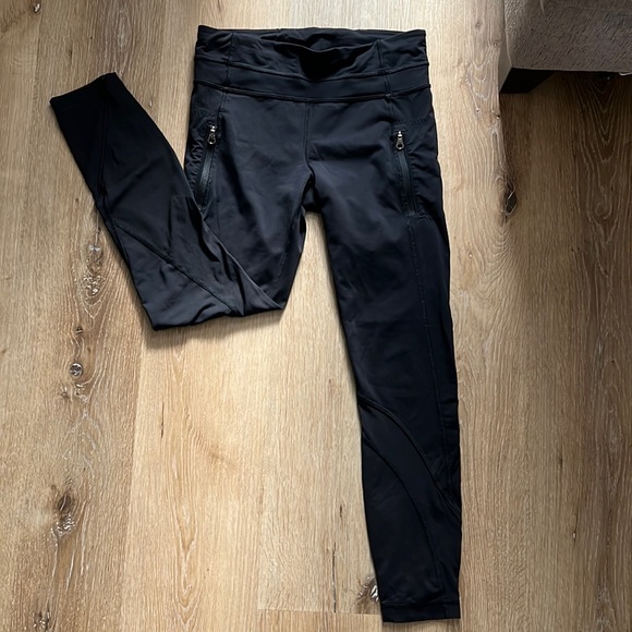 Lululemon size 6 black running leggings with mesh around calf. - Picture 1 of 4